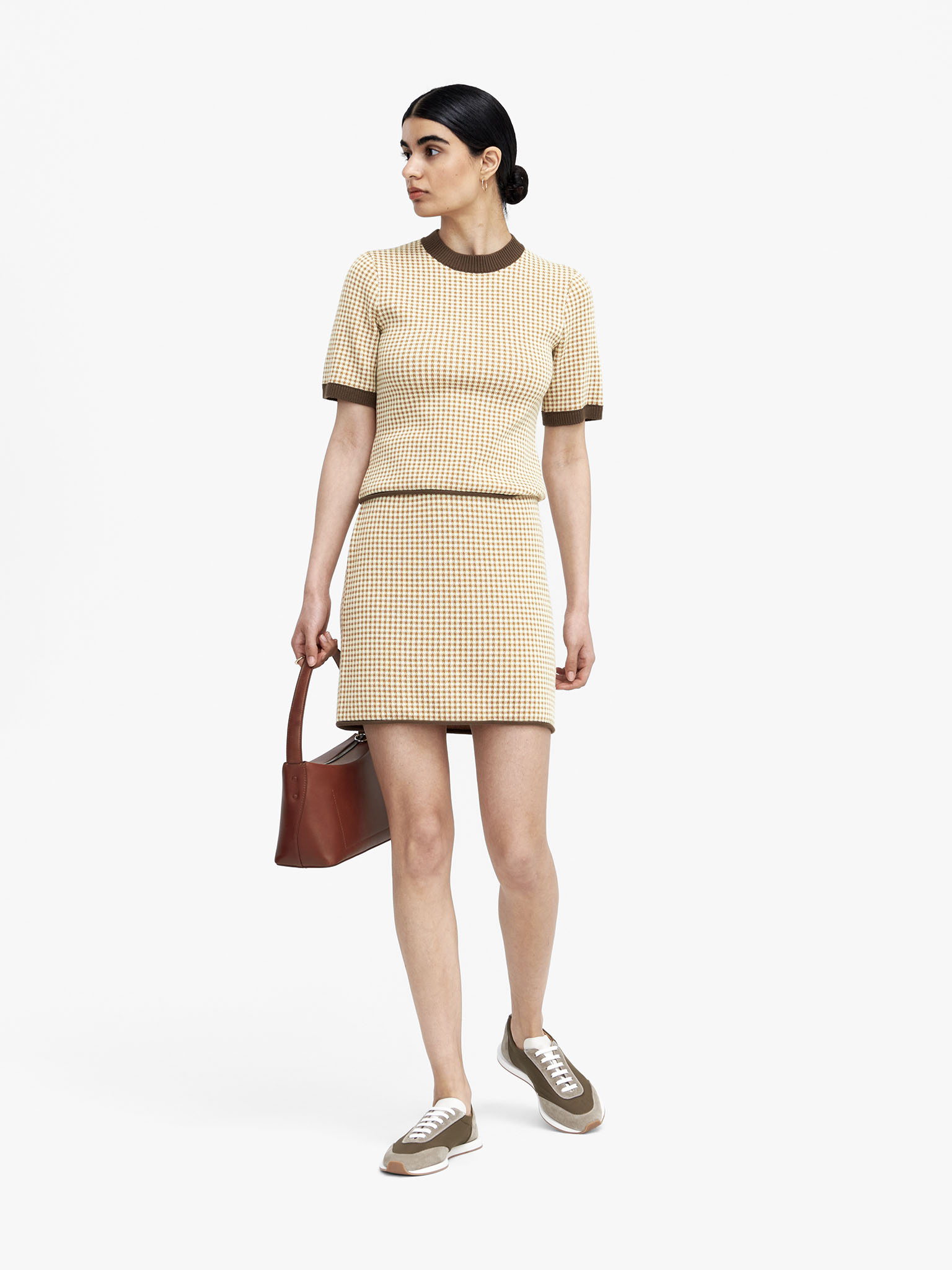 Woman in checked set