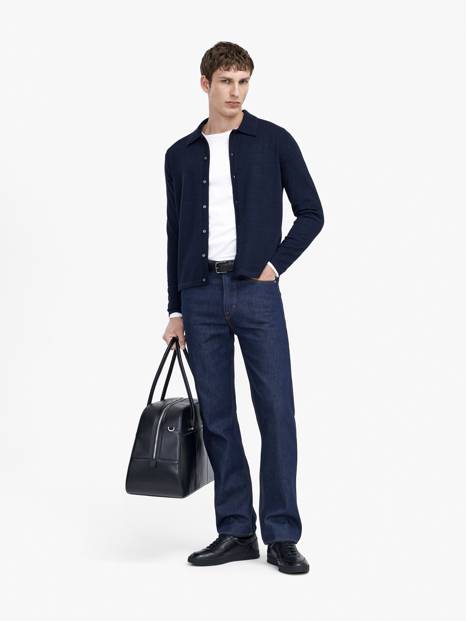 Man in dark blue jeans and navy overshirt