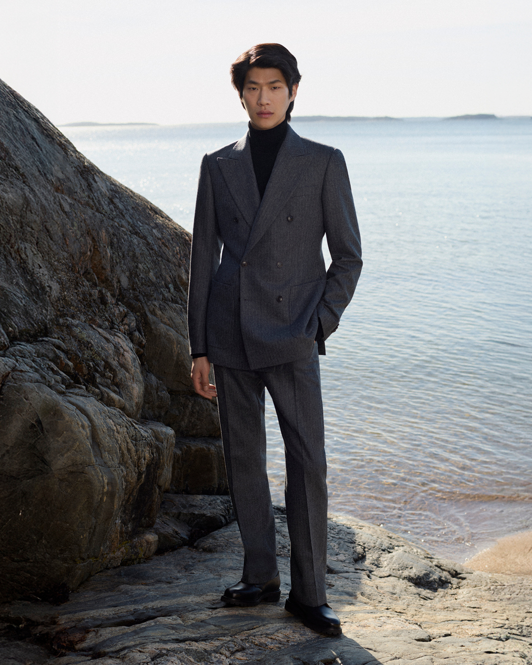 man in dark grey suit